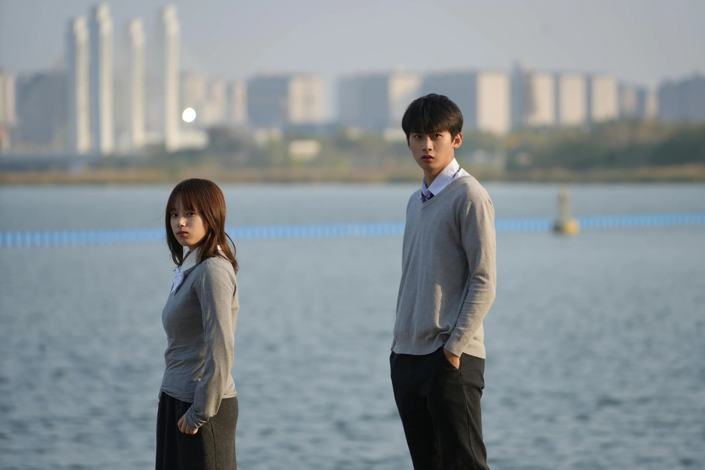 Zhengzhou city skyline at sunset with modern buildings and warm light